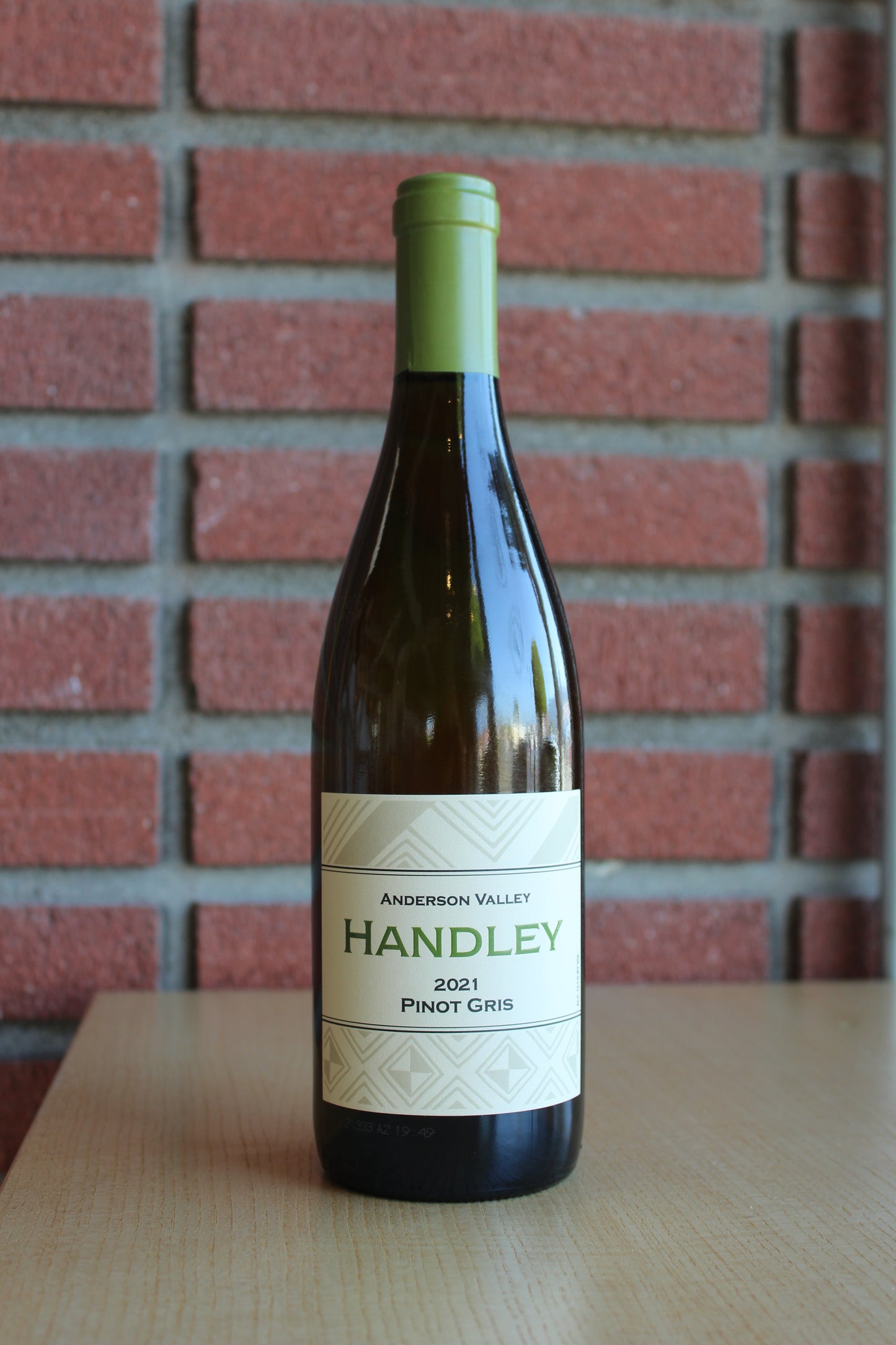 Handley Cellars Pinot Gris Bottle on a brick background