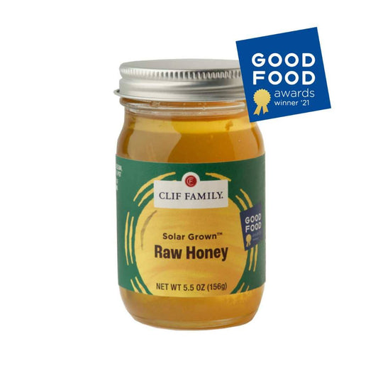 clif family solar grown raw honey jar with a "good food awards winner '21" emblem
