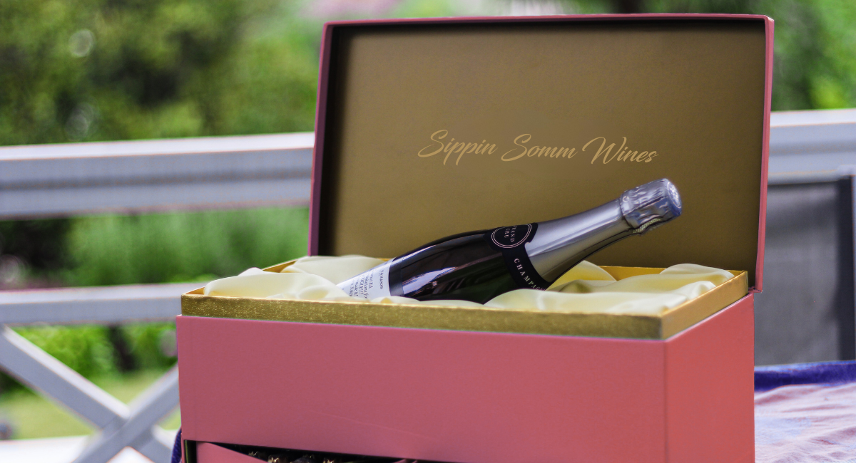 Bottle of champagne in a gift box