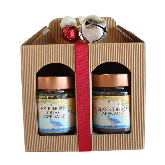 Two Beyond the Olive Tapenade jars wrapped in a carrier with red ribbon 