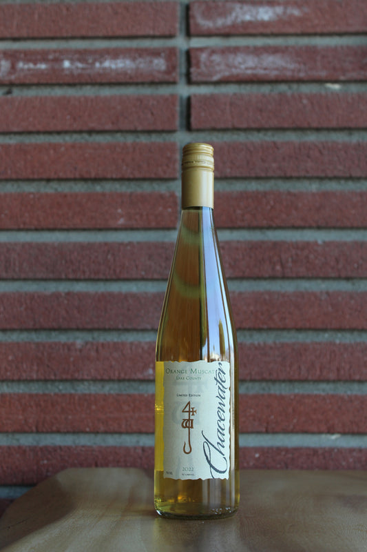 Chacewater Orange Muscat Wine bottle with a visible label on a brick surface