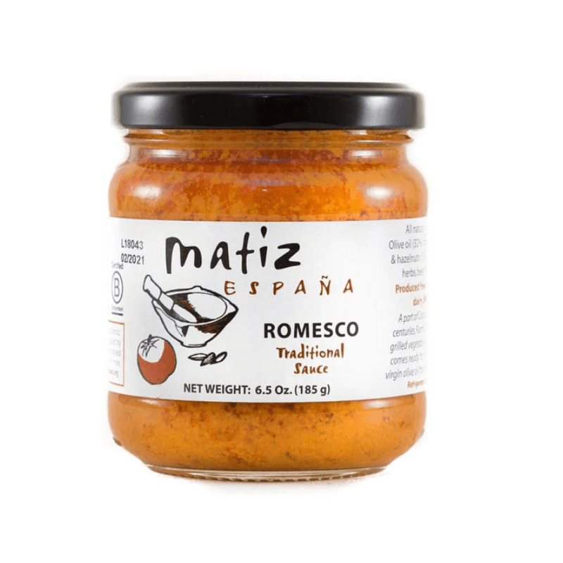jar of matiz romesco on a whit background